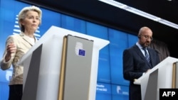 European Council president Charles Michel (R) and Commission president Ursula von der Leyen address the closing press conference of an European Union summit on Ukraine, defense and energy, in Brussels, May 31, 2022.