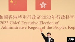 John Lee waves after becoming the city's new chief executive in Hong Kong on May 8, 2022.