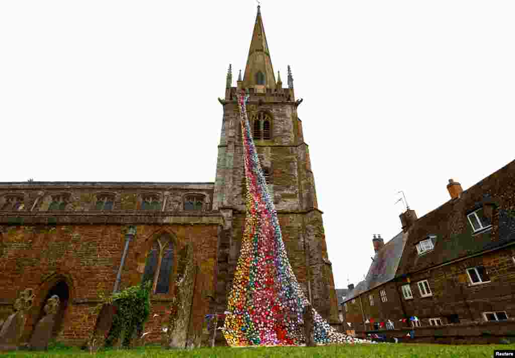 &quot;Flower Tower,&quot; a display of more than 4,300 handmade knitted and crocheted flowers is seen at All Saints Church, ahead of Platinum Jubilee celebrations for Britain&#39;s Queen Elizabeth, in Middleton Cheney.