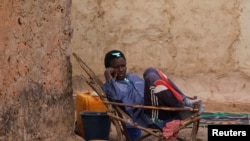 FILE: A young man who fled attacks by Islamist militants in northern Burkina Faso is pictured at a camp for internally displaced people (IDPs) in the capital Ouagadougou, Burkina Faso. Taken 1.29.2022