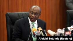 Le gouverneur de la Banque centrale du Nigeria, Godwin Emefiele, s'exprime lors de la réunion mensuelle du Comité de politique monétaire à Abuja, au Nigeria, le 22 mai 2018.