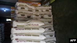 FILE - Wheat flour is seen stockpiled in a warehouse in Ibafo, Ogun State, southwest Nigeria, March 15, 2022. African countries are bracing for the fallout the Russia-Ukraine war will have on their supply chains.