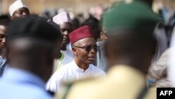 FILE - Kaduna State Governor Mallam Nasir El-Rufai waits to cast his vote in his ward at a polling station in Kaduna on March 9, 2019, during voting for governorship elections. 