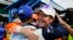 Scott Dixon, of New Zealand, right, celebrates winning the pole with second place finisher Alex Palou, of Spain, during qualifications for the Indianapolis 500 auto race at Indianapolis Motor Speedway in Indianapolis, Indiana, May 22, 2022.