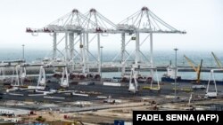 FILE: A general view of the docks and cranes at the Tanger-Med container port in Ksar Sghir, near the northeastern Moroccan port city of Tangiers overlooking the Strait of Gibraltar. Taken Mar. 12, 2018.