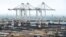 FILE: A general view of the docks and cranes at the Tanger-Med container port in Ksar Sghir, near the northeastern Moroccan port city of Tangiers overlooking the Strait of Gibraltar. Taken Mar. 12, 2018.