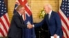 President Joe Biden, right, shakes hands with Australian Prime Minister Anthony Albanese during the Quad leaders summit meeting at Kantei Palace, May 24, 2022, in Tokyo.