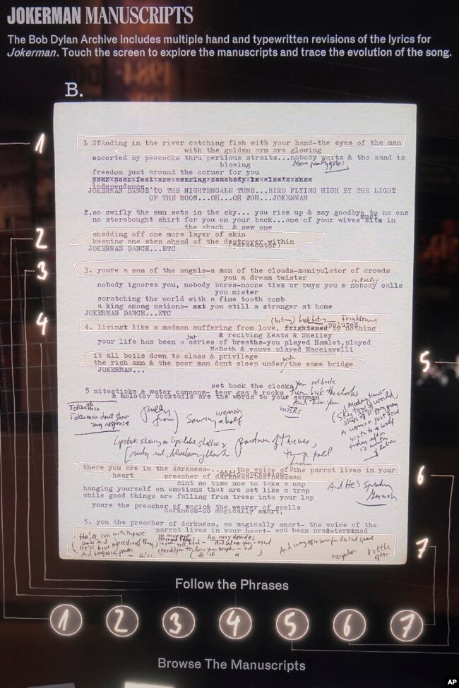 A manuscript for 'Jokerman' in an interactive display at the Bob Dylan Center, May 5, 2022, in Tulsa, Okla.