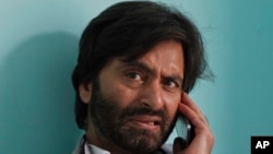 FILE - Kashmiri separatist leader Mohammed Yasin Malik in his office on August 20, 2015.