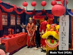 Stand Chinā pada Asian American 24th Celebration di Richmond, Virginia. (VOA/Made Yoni)