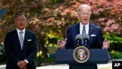 US President Joe Biden speaks during an event with Hyundai Motor Group Executive Chair Euisun Chung, left, at the Grand Hyatt Seoul, May 22, 2022, in Seoul.