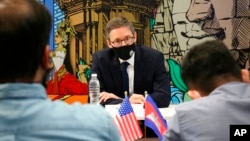 FILE - Counselor of the US Department of State Derek Chollet speaks during a round table briefing with journalists in Phnom Penh, Cambodia, Dec. 10, 2021.