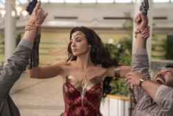This image released by Warner Bros. Entertainment shows Gal Gadot in a scene from "Wonder Woman 1984." (Clay Enos/Warner Bros. Entertainment via AP)