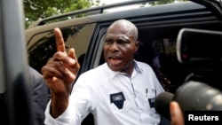 FILE - Martin Fayulu, runner-up in Democratic Republic of Congo's presidential election enters his car after delivering his appeal contesting the Congo's National Independent Electoral Commission results, January 12, 2019. 