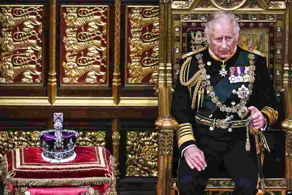 Britain's Prince Charles sits by the The Imperial State Crown in the House of Lords Chamber, during the State Opening of Parliament, in the Houses of Parliament, in London.