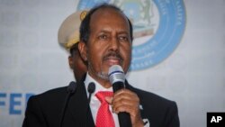 Hassan Sheikh Mohamud speaks after his election win at the Halane military camp in Mogadishu, Somalia, May 15, 2022. 