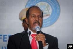 Hassan Sheikh Mohamud speaks after his election win at the Halane military camp in Mogadishu, Somalia, Sunday, May 15, 2022.