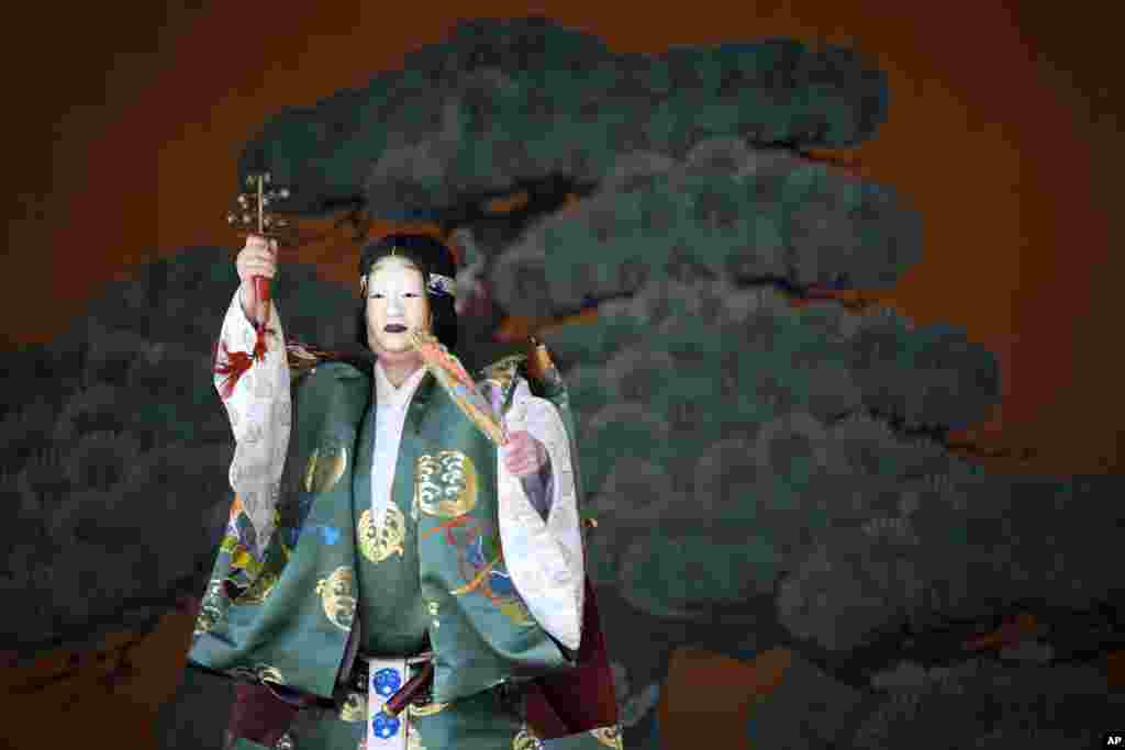 A dancer performs &quot;Noh&quot; dance-drama during a biennial festival called &quot;Kanda Matsuri&quot; at Kanda shrine in Tokyo.