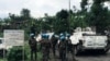 FILE - United Nations Organization Stabilization Mission in the Democratic Republic of the Congo (MONUSCO) peacekeepers gather as they patrol areas affected by the recent attacks by M23 rebels fighters near Rangira in North Kivu in the east of the Democra