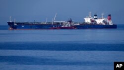 The Pegas tanker, that has recently changed its name to Lana, is seen off the port of Karystos on the Aegean Sea island of Evia, Greece, May 27, 2022. 