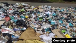 Uncollected garbage in Harare. (Photo: Zimbabwe Lawyers for Human Rights)