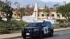 Policijski automobil je viđen nakon smrtonosne pucnjave u crkvi u Laguna Woods, Kalifornija, SAD, 15. maja 2022. REUTERS/David Swanson