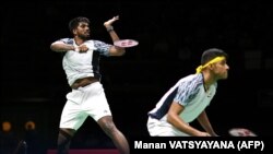 Atlet India Satwiksairaj Rankireddy-Chirag Shetty melawan Mohammad Ahsan-Kevin Sanjaya Sukamuljo pada final Piala Thomas, 15 Mei 2022. 