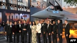 FILE - Members of the cast pose upon arrival for the UK premiere of the film "Top Gun: Maverick" in London, May 19, 2022.