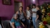 Relatives of slain journalist Yessenia Mollinedo Falconi attend her wake at the family's home in Minatitlan, Veracruz state, Mexico, May 10, 2022. 