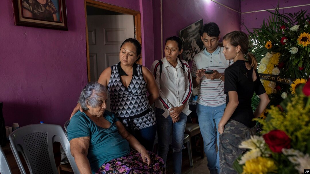 Relatives of slain journalist Yessenia Mollinedo Falconi attend her wake at the family's home in Minatitlan, Veracruz state, Mexico, May 10, 2022. 