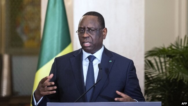 FILE - Senegal's President Macky Sall, who currently heads the African Union, speaks during a press conference in Dakar, May 1, 2022.