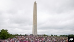 Abortion rights demonstrators rally May 14, 2022, on the National Mall in Washington, during protests across the country. 