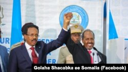 Somalia's Elected President Hassan Sh. Mohamud and the outgoing president Mohamed Abdullahi Farmaajo