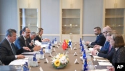 FILE - Delegations from Turkey, left, and Sweden confer in Ankara, Turkey, May 25, 2022. Senior officials from the two nations met to try to overcome Turkey's strong objections to Sweden's and Finland's bids to join NATO.