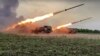 In this handout photo released by Russian Defense Ministry Press Service released on June 1, 2022, The Russian military's Uragan multiple rocket launchers fire rockets at Ukrainian troops at an undisclosed location.