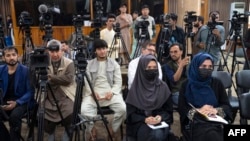 Afghan journalists attend a press conference being addressed by Taliban's acting first deputy prime minister Abdul Ghani Baradar (not pictured) in Kabul, May 24, 2022. Two Afghan journalists went missing from Kabul and their whereabouts were unknown since May 24.