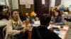 In an underground bunker, volunteers set up temporary housing for families from Mariopul on April 27, 2022 in Zaporizhzhya, Ukraine (Yan Boechat/VOA)