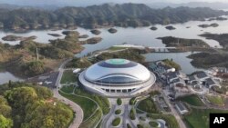 In this photo released by Xinhua News Agency, an aerial photo taken on March 28, 2022, shows a view of Chun'an Jieshou Sports Centre Velodrome, a venue of the 19th Asian Games Hangzhou 2022 in Hangzhou, eastern China's Zhejiang Province.