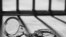 Handcuff and prison bars