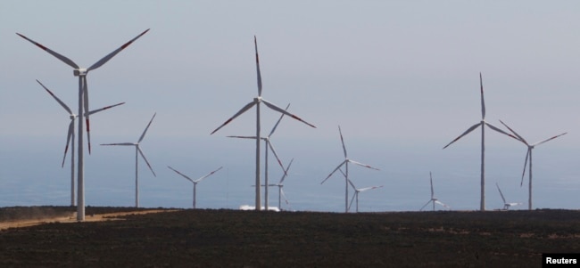 FILE - Wind mills are seen at the Monte Redondo wind farm outside Ovalle, 326 km north of Santiago, February 8, 2011. (REUTERS/VÃ­ctor Ruiz Caballero)