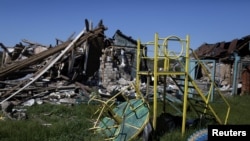 FILE - A damaged residential area is pictured in Chuhuiv, near Kharkiv, amid Russia's attack on Ukraine, May 5, 2022.