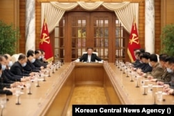 North Korea's Politburo meets in response to the COVID-19 crisis, in May 2022. (Korean Central News Agency)