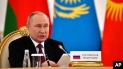 Le président russe Vladimir Poutine lors d'une réunion des dirigeants de l'Organisation du traité de sécurité collective au Kremlin, le 16 mai 2022.