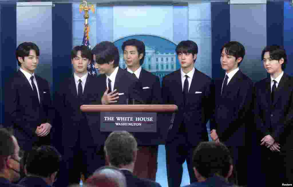 Members of the K-Pop band BTS are seen during the daily briefing at the White House in Washington to discuss anti-Asian hate crimes and Asian inclusion and representation, May 31. 2022.