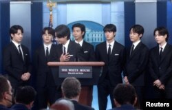 Members of the K-Pop band BTS (not in order) Kim Taehyung, Kim Seokjin, Jeon Jeongguk, Kim Namjoon, Park Jimin, Jung Hoseok and Min Yoon-gi makes statements against anti-Asian hate crimes and for inclusion and representation during the daily briefing at t