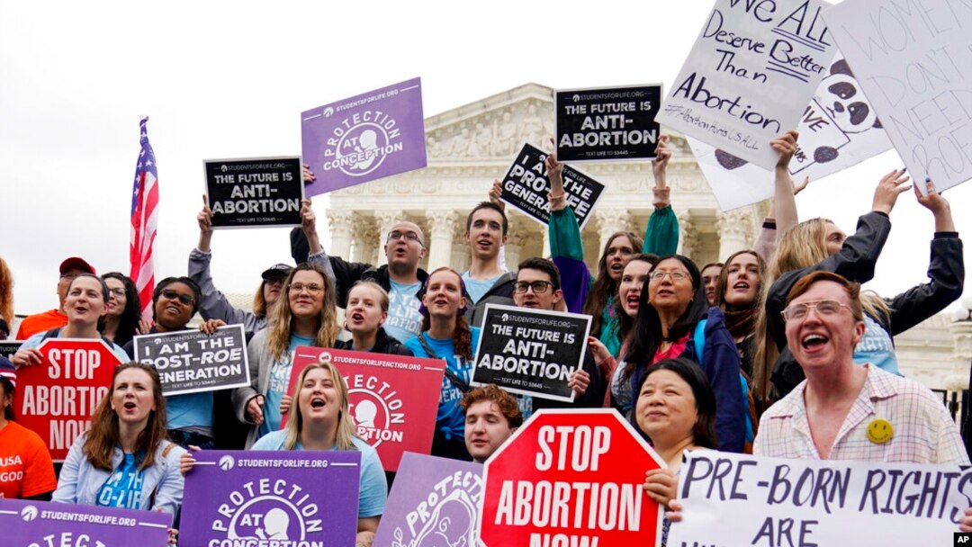 Demonstrators protest outside of the US Supreme Court, May 16, 2022, in Washington.