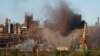 Smoke rises from the Metallurgical Combine Azovstal in Mariupol during shelling, in Mariupol, in eastern Ukraine, May 7, 2022.