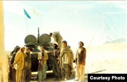 Hussain Andaryas (center) fought the Soviet army in Afghanistan as a 