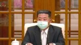 رهبر کره شمالی با ماسک در تلویزیون ظاهر شد