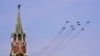 Russian MiG-29SMT jet fighters forming the symbol "Z" in support of Russian military action in Ukraine, fly over Red Square during the general rehearsal of the Victory Day military parade in central Moscow on May 7, 2022.